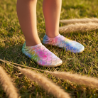 Colorful Finny Shoes water shoes on feet standing on grass